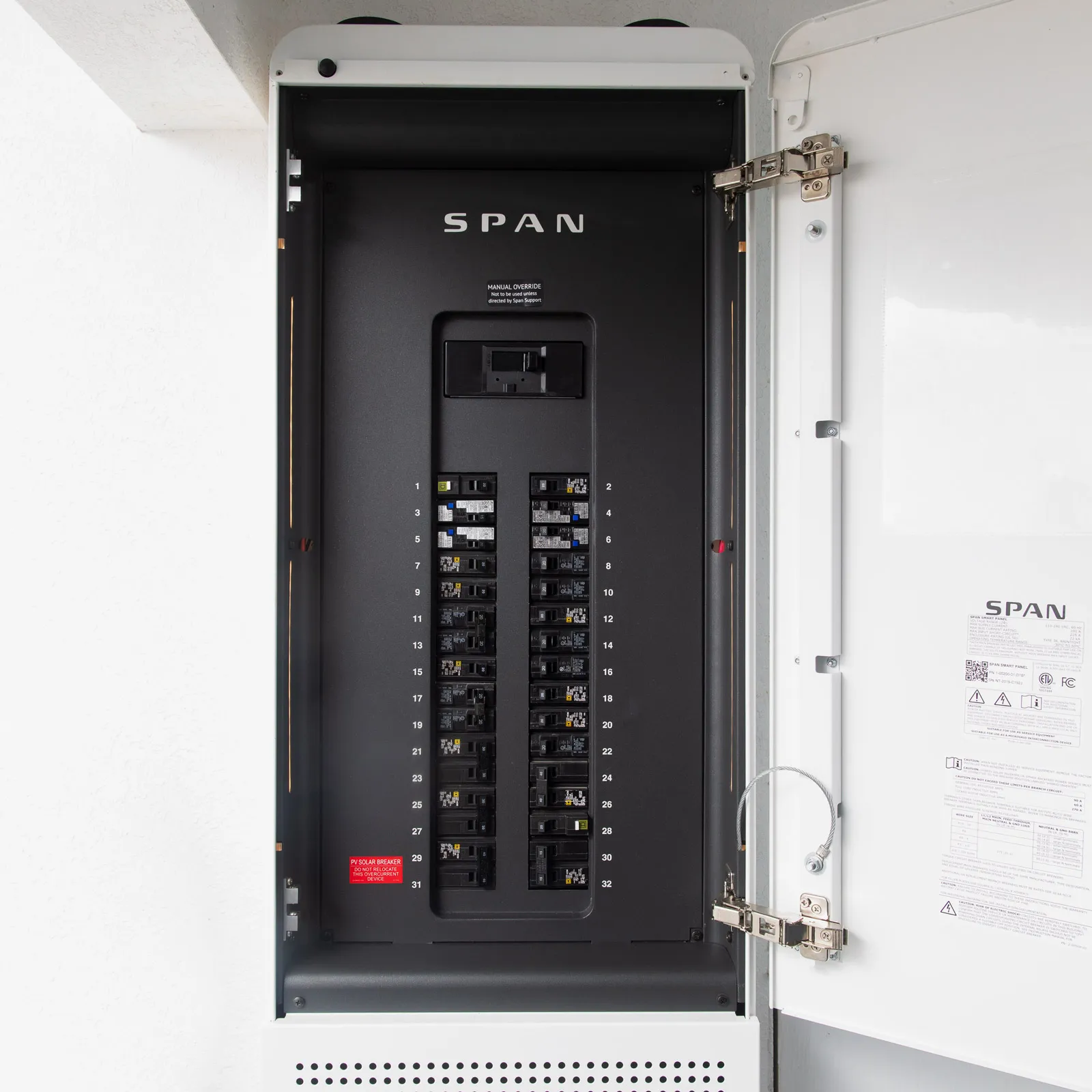 Modern electrical panel with multiple circuit breakers, labeled "SPAN," showcasing a sleek design suitable for residential use, emphasizing efficient power distribution and safety for Central Florida homes.