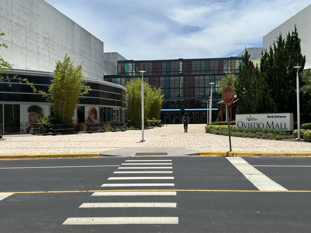 Oviedo Mall North Entrance in Oviedo, FL. Pedestrian crosswalk and mall signage. Heating maintenance for commercial buildings.