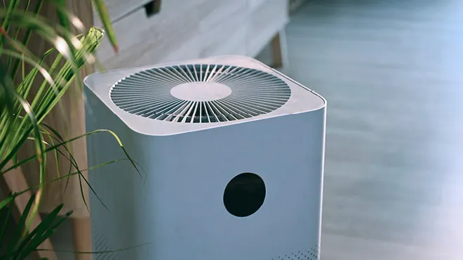 Air Cleaning System: Modern air purifier in a home setting. Indoor air quality control for cleaner, healthier living in Oviedo, FL.