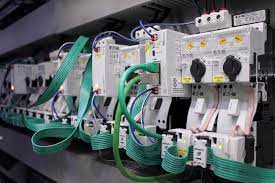 Electrical panel with wires and switches. Whole home rewiring components.