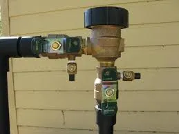 Backflow preventer assembly. Essential for water safety, this device stops contaminants from entering potable water systems. Backflow Testing.