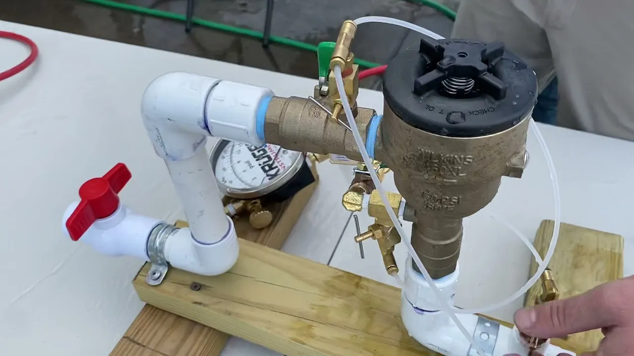 Backflow preventer assembly for testing. Device with gauge, valves, and pipes for backflow testing in Oviedo, FL.