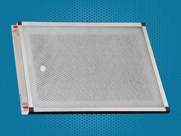 Air Cleaning System filter. Air purification filter with a metal frame and a white mesh, part of an HVAC system for improved indoor air quality.
