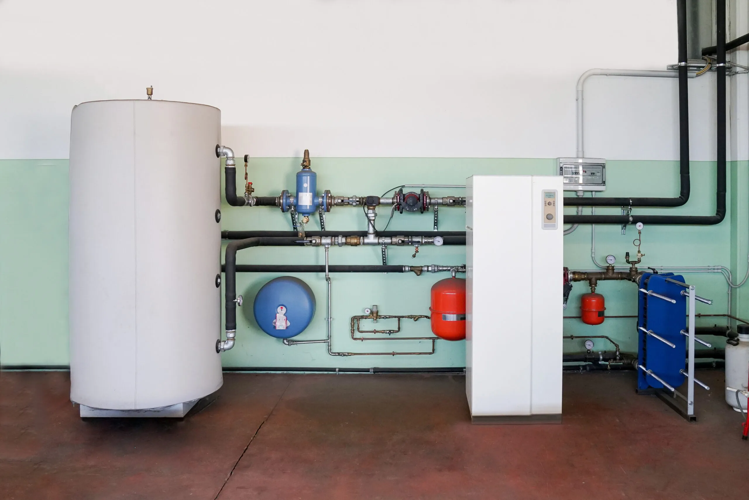 Heat Pumps setup with pipes and tanks. Efficient heating and cooling solutions for homes and businesses. Systems installed in Oviedo, FL.
