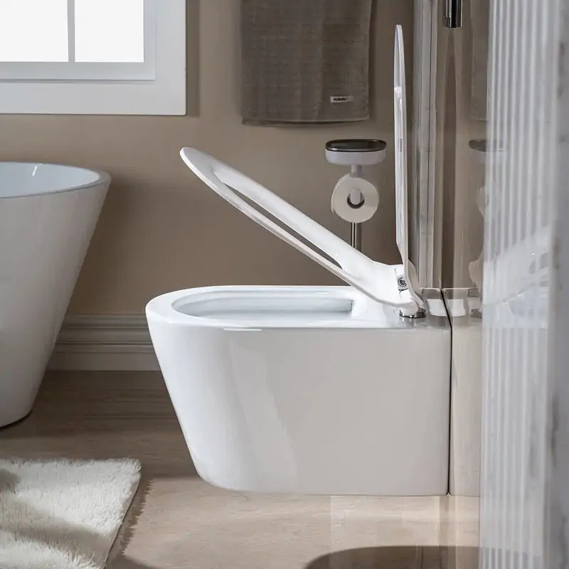 Wall-mounted toilet in modern bathroom, featuring a sleek design and open lid, emphasizing space-saving and stylish functionality relevant to plumbing services.