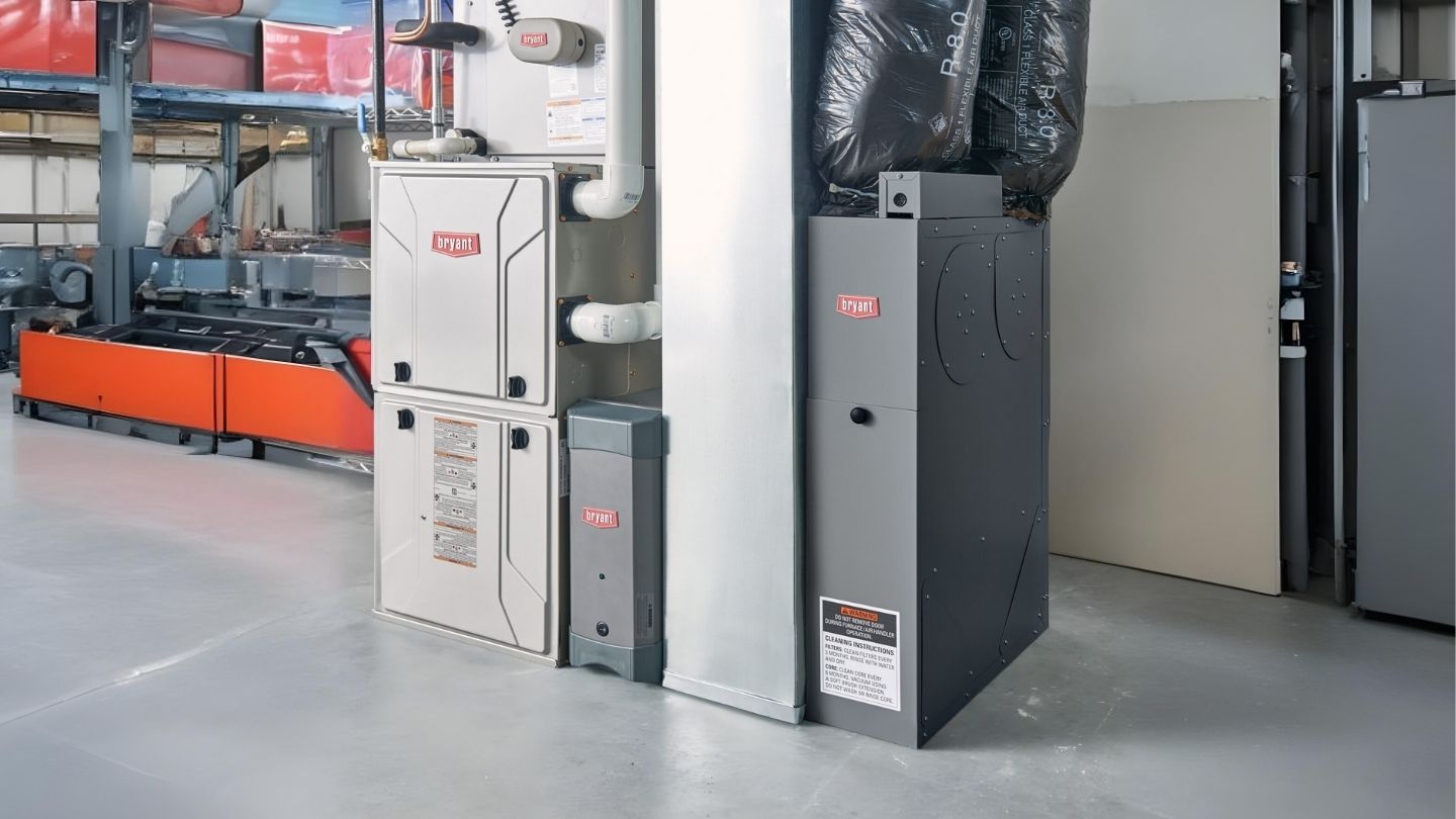 Gas furnace and heat pump systems in a maintenance setting, showcasing Bryant brand equipment, emphasizing heating efficiency and reliability for Oviedo homes.