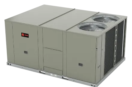 Commercial Trane HVAC unit isolated on black background. Regular AC Maintenance keeps this rooftop cooling system efficient.